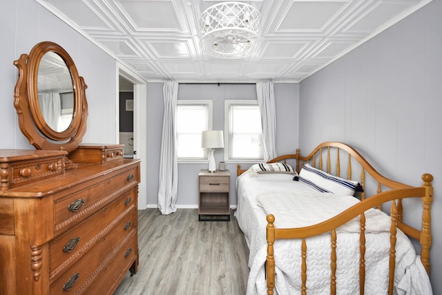 bedroom with light wood-type flooring