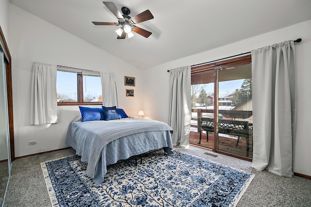 carpeted bedroom featuring ceiling fan, lofted ceiling, and access to exterior