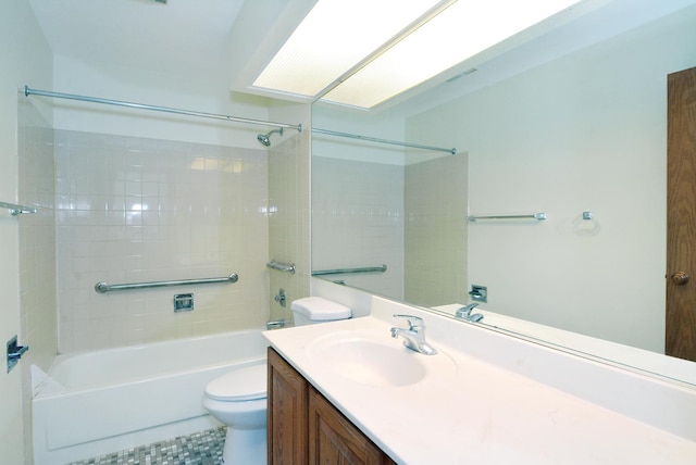 full bathroom with vanity, tub / shower combination, and toilet