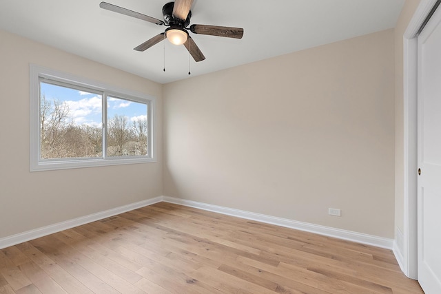 unfurnished room with light hardwood / wood-style flooring and ceiling fan