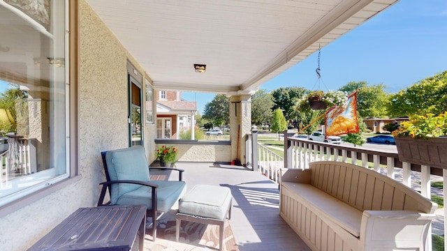 view of patio featuring a porch