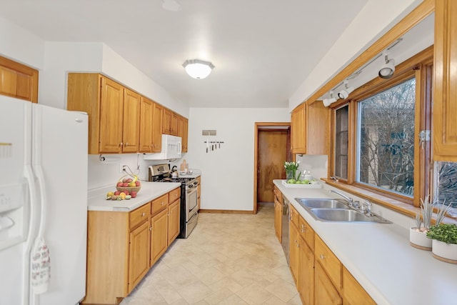 kitchen featuring sink and white appliances