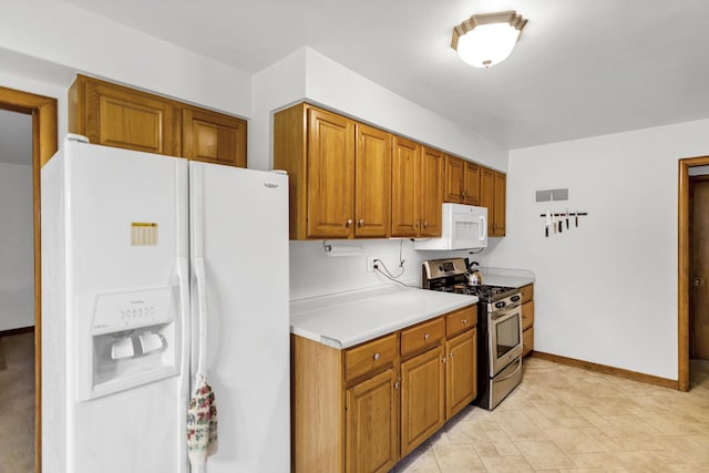 kitchen featuring white appliances