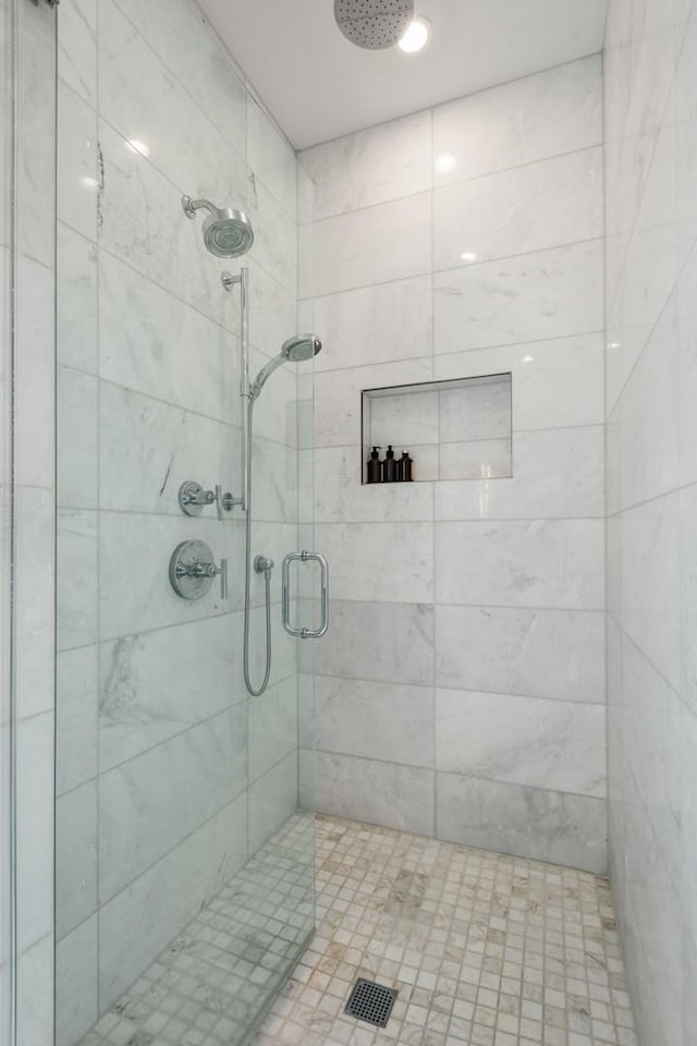 bathroom featuring an enclosed shower