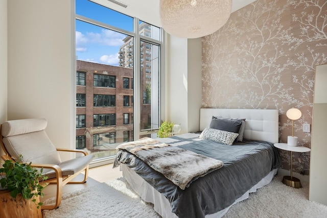 bedroom with expansive windows