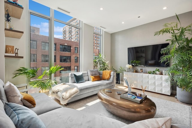 living room with light hardwood / wood-style flooring