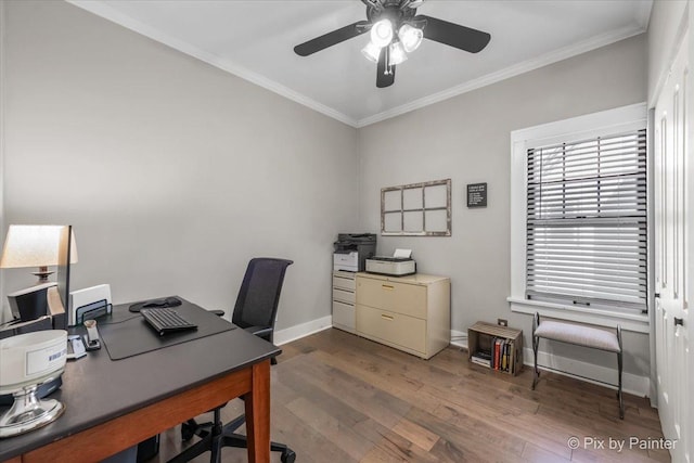 office space with crown molding, dark hardwood / wood-style floors, and ceiling fan