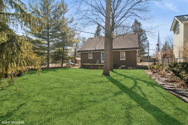 view of yard with fence