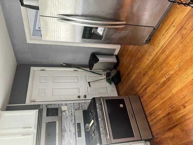 kitchen with wood walls