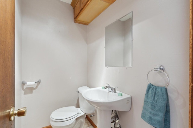 bathroom featuring toilet