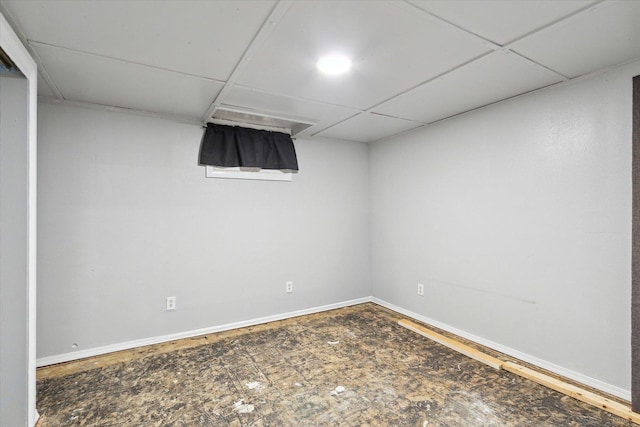 empty room with a drop ceiling