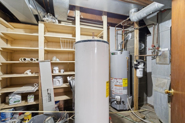 utility room featuring gas water heater