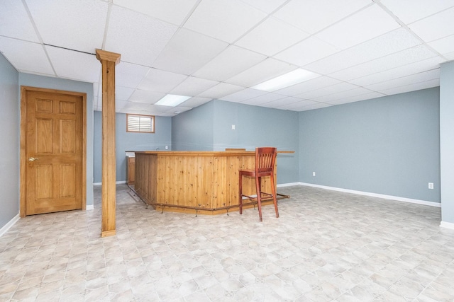 bar with a paneled ceiling