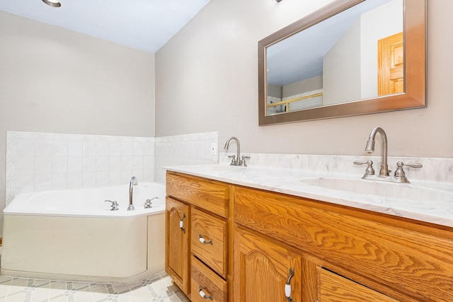 bathroom featuring a bathing tub and vanity