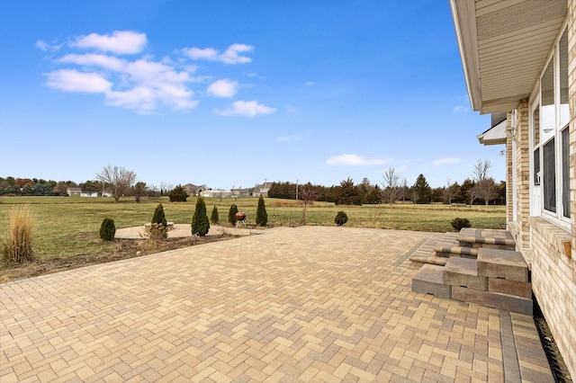 view of patio / terrace featuring a rural view