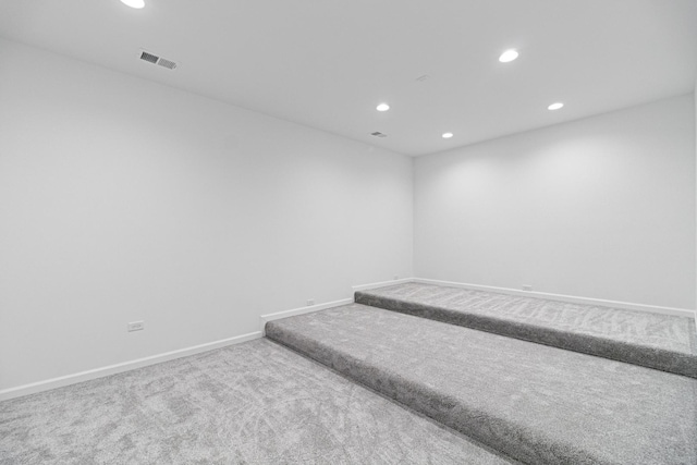 unfurnished room with carpet flooring