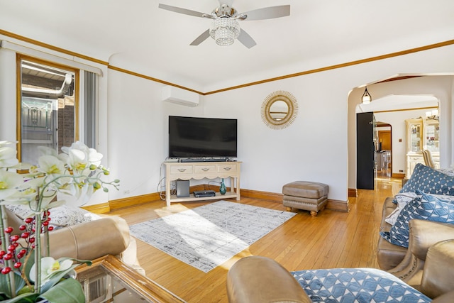6159 S Karlov Ave, Chicago, IL 60629 - living room with light hardwood / wood-style floors, ceiling fan, crown molding, and a wall mounted AC