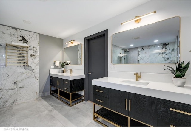 bathroom with concrete flooring, walk in shower, and vanity