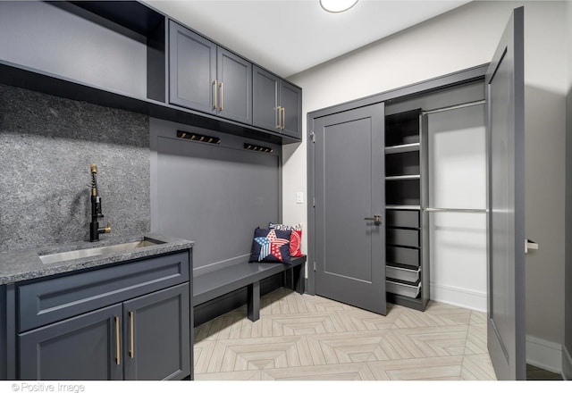 mudroom featuring sink