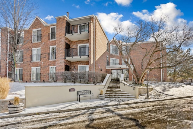 view of snow covered property