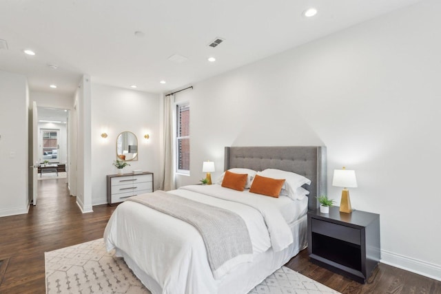 bedroom featuring dark hardwood / wood-style floors