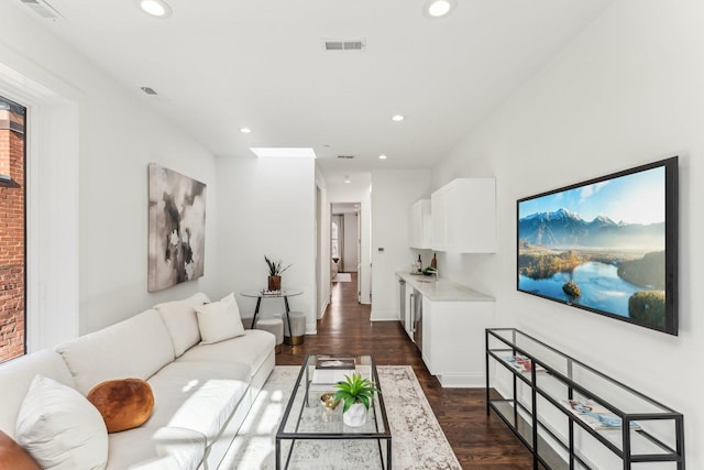 living room featuring dark hardwood / wood-style floors