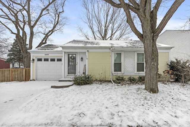 single story home with a garage