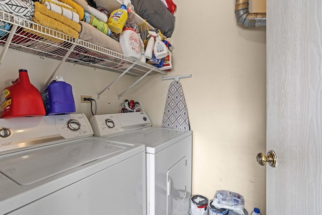 washroom featuring independent washer and dryer