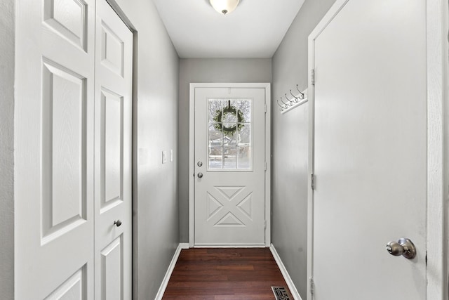 doorway featuring dark hardwood / wood-style floors