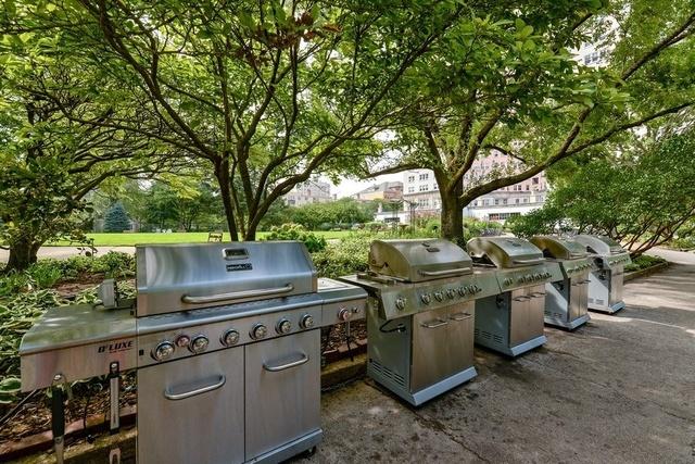 view of patio with a grill