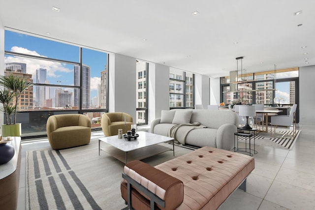 tiled living room with sink and expansive windows