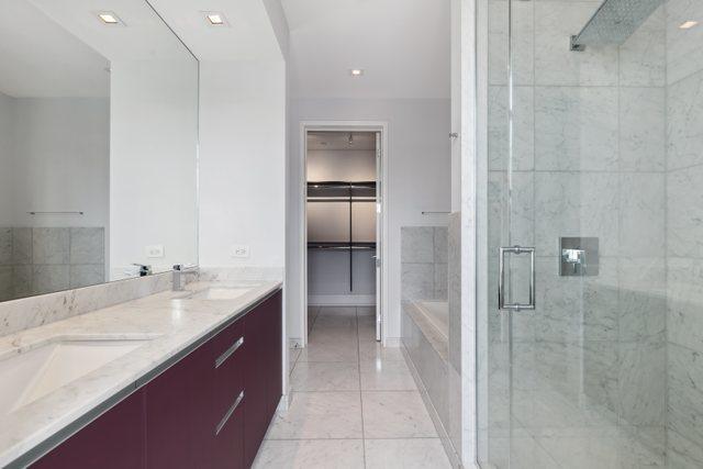 bathroom with vanity, separate shower and tub, and tile patterned flooring