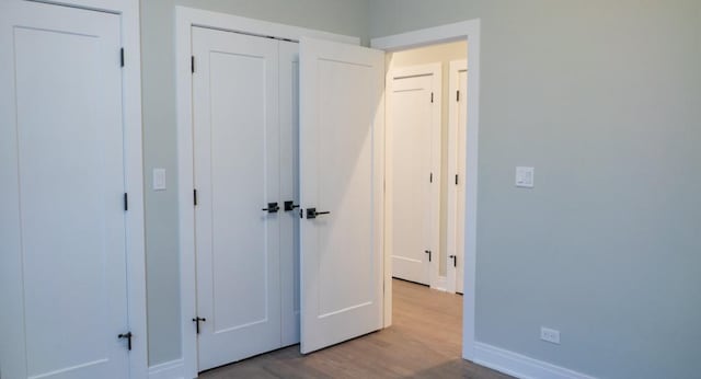 unfurnished bedroom featuring light hardwood / wood-style flooring