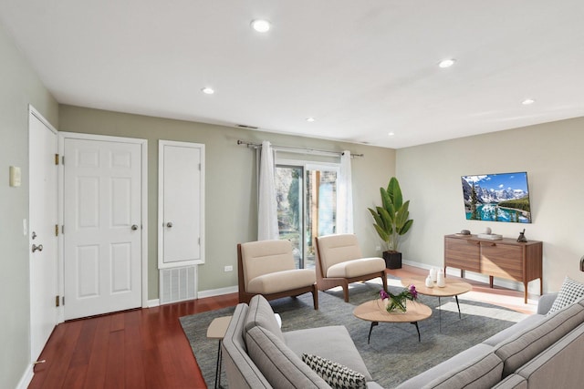 living room featuring dark hardwood / wood-style flooring