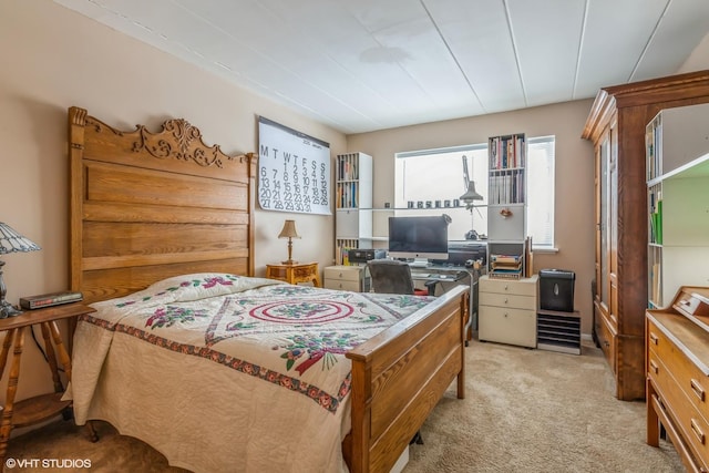 bedroom with light carpet