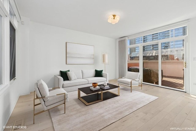 living room featuring light wood-type flooring