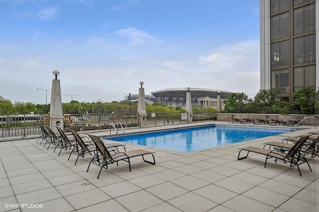 view of pool featuring a patio