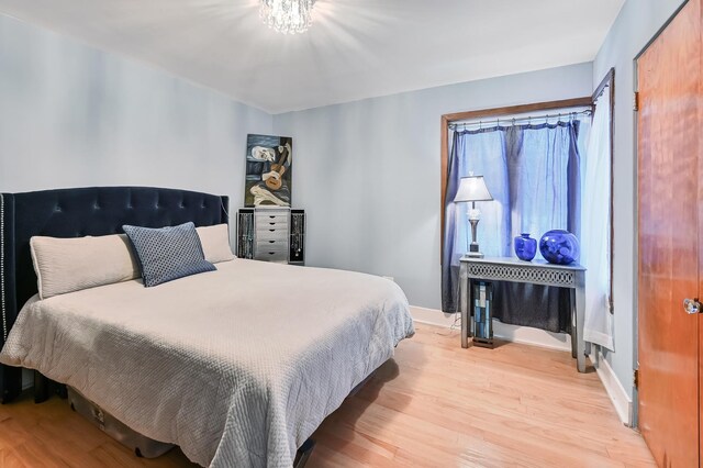 bedroom with light wood-type flooring