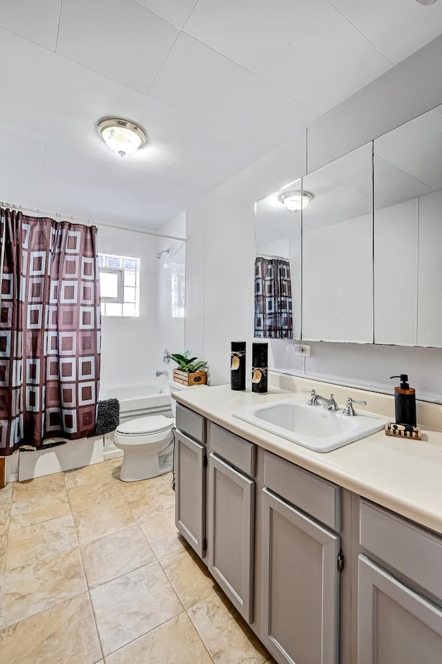 full bathroom with vanity, toilet, and shower / tub combo