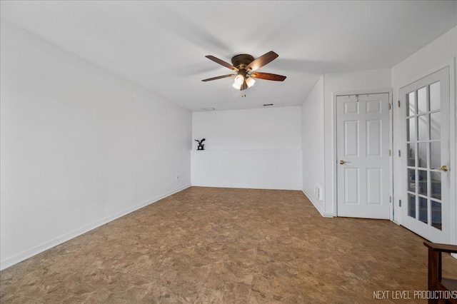 spare room with ceiling fan