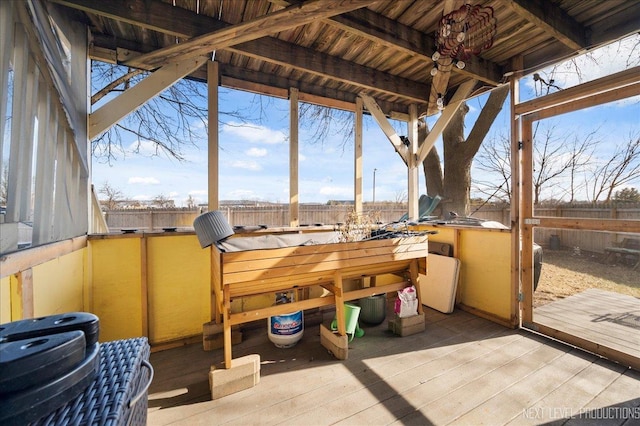 view of patio / terrace with a wooden deck and a hot tub