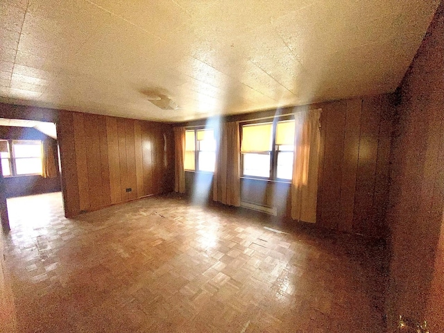 empty room with wood walls