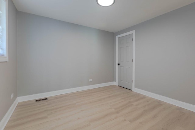 unfurnished room featuring light hardwood / wood-style flooring