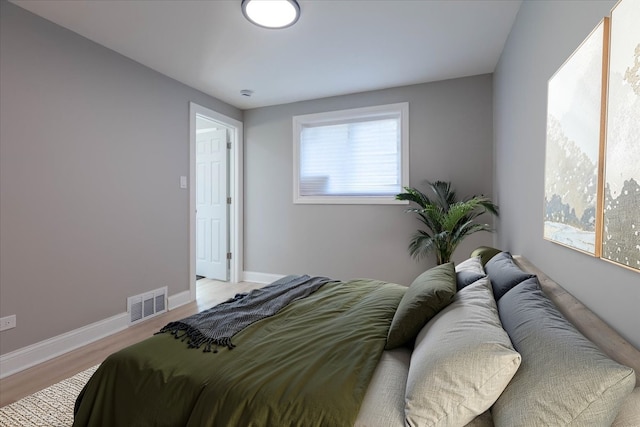 bedroom featuring light wood-type flooring