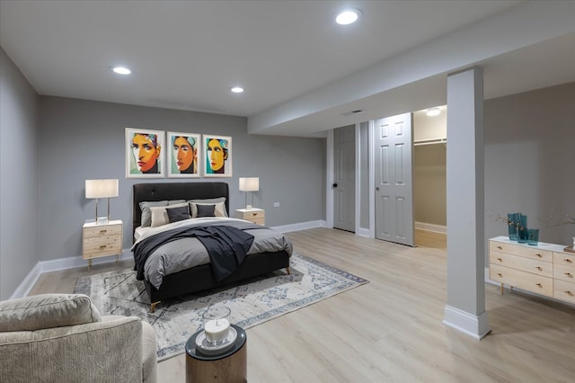 bedroom featuring light hardwood / wood-style floors