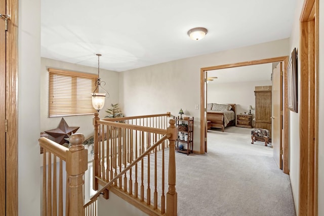 hallway with light carpet