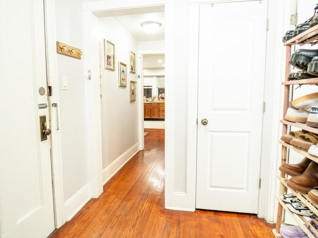 corridor featuring light wood-type flooring