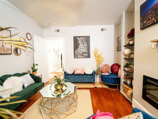 living room with wood-type flooring