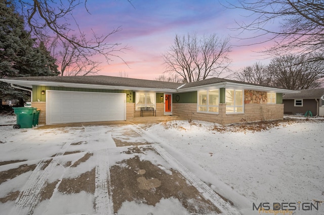 ranch-style home with a garage