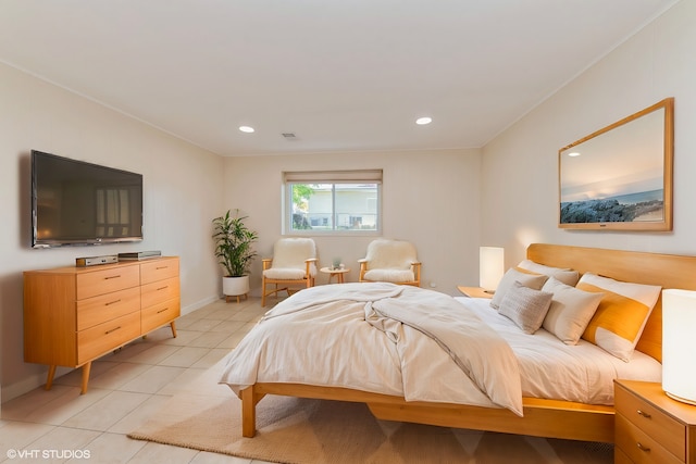 bedroom featuring light tile patterned flooring